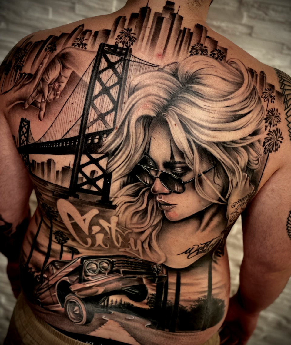 Unmistakable - Ambassadors and Artists - Flawlezz Ink - Tattoo eines der Golden Gate Bridge und eines Frauenkopfes über ganzen Rücken