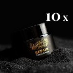 Unmistakable - Vegane Premium Tattoopflege - Repair Tattoo Cream 10er Pack Glas auf schwarzem Sand mit Aufschrift 10 x