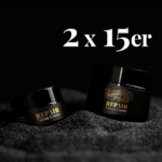 Unmistakable - Vegane Premium Tattoopflege - Repair Tattoo Cream 30er Pack Glas auf schwarzem Sand mit Aufschrift 2x 15 x