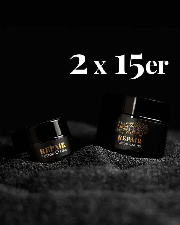 Unmistakable - Vegane Premium Tattoopflege - Repair Tattoo Creme 30er Pack Glas auf schwarzem Sand mit Aufschrift 2x 15 x